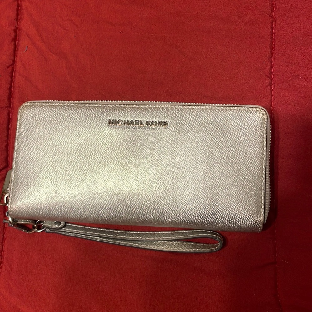 Silver MK wristlet.